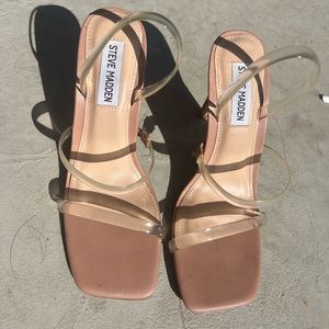 Tan/clear Steve Madden heels.